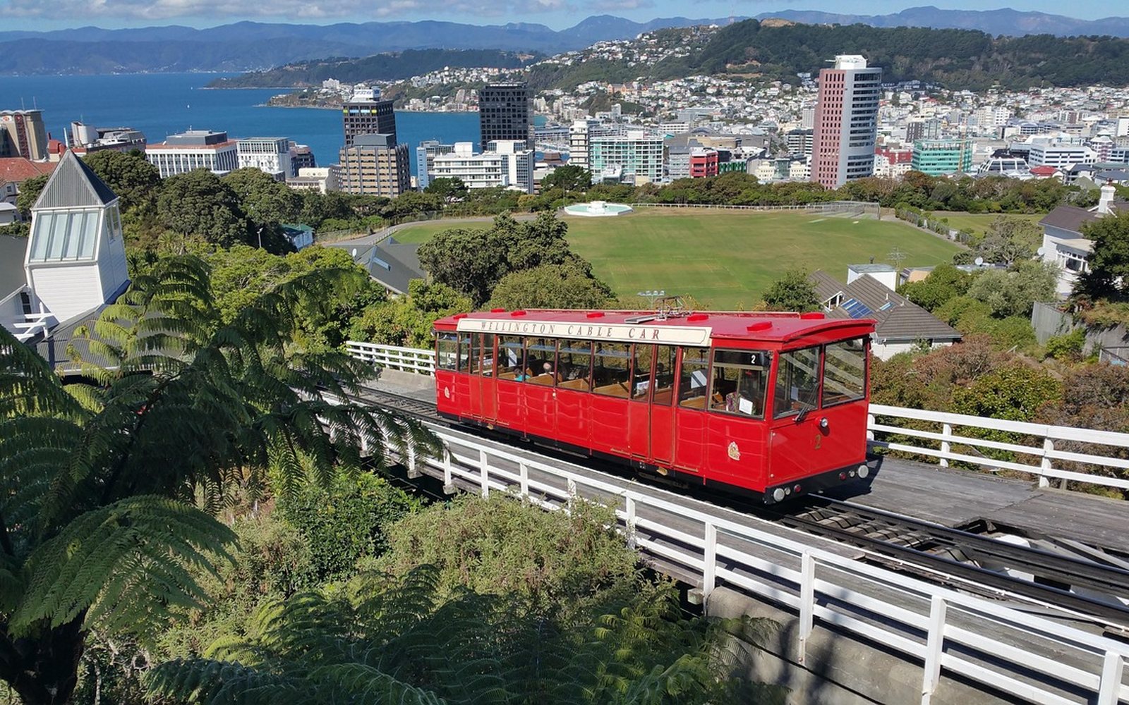 Wellington cable car climbing above the harbour and city